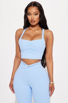 Available In Black And Light Blue. Sports Bra Square Neck Sleeveless Super Soft Strappy Detail Ruched Stretch Pair With "Ignite Super Soft Yoga Pant" Body: 77% Polyester 23% Spandex Inner Mesh: 82% Nylon 18% Spandex Imported | Blaze Super Soft Sports Bra in Light Blue size XL by Fashion Nova Blue Sleeveless Activewear With Built-in Bra, Blue Sleeveless Sports Bra For Gym, Blue Sleeveless Moisture-wicking Sports Bra, Sleeveless Elastane Sports Bra For Yoga, Blue High Stretch Moisture-wicking Tank Top, High Stretch Blue Moisture-wicking Tank Top, Sleeveless Elastane Sports Bra, Sleeveless Elastane Top For Pilates, Elastane Sports Bra