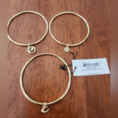 Brand New Coach Bangles With Charm. Coach Metal Bangle Jewelry, Everyday Gold Coach Jewelry, Coach Adjustable Bangle, Adjustable Coach Bangle, Coach Metal Bracelet Jewelry, Coach Jewelry, Jewelry Brand, Jewelry Branding, Womens Jewelry Bracelets