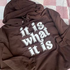 Unisex size hoodie in a brown color with a white, puff print graphic on the front. **Colors may show up differently on different screens Hoodie is: - 8 oz., 50% cotton, 50% polyester - Double-needle coverseaming on neck, armholes and waistband - Double-ply hood with grommets and matching drawcord Brown Crew Neck Hoodie With Letter Print, Brown Hoodie Sweatshirt With Letter Print, Trendy Brown Hoodie, Casual Brown Hoodie With Letter Print, Brown Hooded Tops With Letter Print, Trendy Brown Hoodie Sweatshirt, Hooded Brown Tops With Letter Print, Brown Letter Print Hoodie Sweatshirt, Puff Printing Hoodie