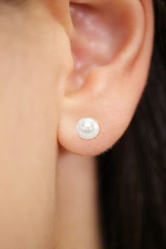 ◆ Crafted in 14K Gold and Fresh Water Pearls ◆ Pearl Size: 7mm ◆ Secure push-back locks to ensure an easy, comfortable, and safe wear ◆ Same day shipping (except weekends) ◆ Made in the USA! Pearl Earrings Studs Classy Gold, Pearl Stud Earrings Classy, Pearl Stud Earrings Clip On, Water Pearls, Freshwater Cultured Pearls, Pearl Stud Earrings, Pearl Size, Pearl Studs, Gold Pearl