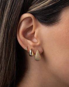 Meet your new favorite statement studs! These 14k gold woven teardrop earrings are all about bold texture and bubbly vibes. Their curvaceous, mini woven design adds a luxe, tactile feel that elevates any look, from a strapless gown to a classic white tee. Effortless, feminine, and a trendy must-have for the fashion-forward woman—get ready to steal the spotlight! Size: Approx. 9.5mm(W) x 16.4mm(H) Total Weight: Approx. 3.2 grams (per pair) Standard Production: 3-5 business days Rush Order Product 14k Gold Teardrop Earrings, Necklace Guide, Strapless Gown, Disc Necklace, Woven Design, Earring Sale, Wedding Wear, White Tee, Personalized Necklace