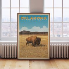 an image of a bison in the middle of a field that says, oklahoma