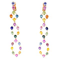 This 18K rose gold elegant chandelier earrings are from our Riad collection. These alluring earrings are made of multi-coloured sapphires in total of 9.95 Carat and natural white diamonds in total of 0.62 Carat. The total metal weight is 8.39 gr. They are 7cm long. Pure elegance! The Riad Collection is the spring/summer 2022 collection of Vitale 1913. Inspired by the colorful oriental gardens of Marrakech, and their geometric shapes, Riad recalls our deep Mediterranean roots and connects them to Gold Diamond Drop Earrings, Round Diamond Pendant, Sapphire Diamond Pendant, Pure Elegance, Colorless Diamond, Elegant Pendant, Rose Gold Pendant, Spring Summer 2022, Brown Diamond