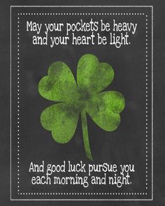 a four leaf clover with the words may your pockets be heavy and your heart be light