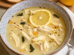 a bowl filled with chicken and lemon soup