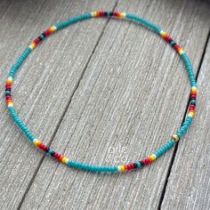 Dainty native American anklet with colorful tiny seed beads strung on a high quality latex free stretch cord. This dainty anklet looks great by itself or layered with another piece.  The anklet has no clasp, just slips over your fit and comfortably adjust to your ankle. All anklets are customizable to the size you need so please be sure to measure your ankle where you want your anklet to sit. You can choose your size from the dropdown menu. Please note: All jewelry is handmade with the Best qual Casual Turquoise Friendship Bracelets With Tiny Beads, Turquoise Friendship Bracelets With Colorful Beads For Festivals, Bohemian Green Anklets With Tiny Beads, Turquoise Beaded Festival Anklets, Multicolor Tiny Beads Anklets For Festivals, Turquoise Anklets With Colorful Beads For Gift, Adjustable Turquoise Anklet With Tiny Beads, Festival Turquoise Bracelets With Tiny Beads, Festival Turquoise Anklets With Colorful Beads