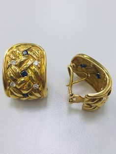 Beautiful and elegant. Classic 18kt yellow gold earrings Omega backs Set with approximately .70 cts. of fine diamonds Also set with approximately .60 cts. of sapphires Weight is 22.8 grams Measure 1 inch long x 5/8 of an inch wide Marked CIT Tested and guaranteed Luxury Sapphire Diamond Earrings In Yellow Gold, Luxury Sapphire Yellow Gold Earrings, Formal Sapphire Diamond Earrings In Yellow Gold, Formal Yellow Gold Sapphire Diamond Earrings, Gold Sapphire Diamond Earrings For Anniversary, Formal Yellow Gold Sapphire Earrings, Anniversary Yellow Gold Sapphire Earrings, Hallmarked Yellow Gold Sapphire Earrings, Hallmarked Sapphire Earrings In Yellow Gold