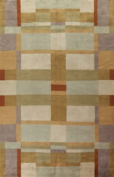 an area rug with squares and rectangles in various shades of brown, beige, green, tan and grey