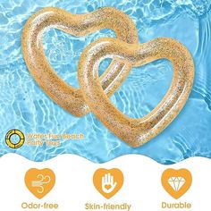 two gold hearts floating on top of a blue swimming pool with text saying, water fun beach party toys