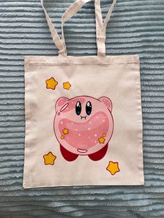 a pink bag with a cartoon character on it