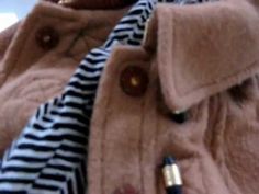 a close up view of a tie and jacket