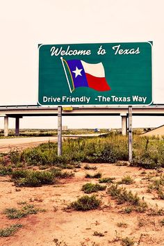 a welcome to texas sign in the middle of nowhere