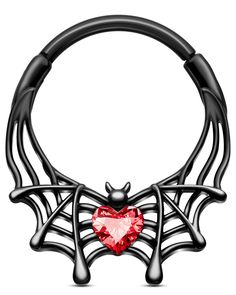 a black spider web with a heart shaped jewel on it's back end, in front of a white background