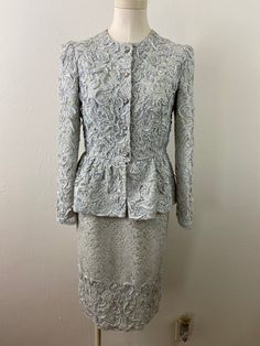 This drees is amazing!! Two pieces, skirt and top Blouse with peplum hip. In good condition Full lining in silk soft taffeta. Silver rhinestone buttons. Very sophisticated and good elaborate in France by Endien LTD.  32" to 36" bust  30" waist  14" shoulder to shoulder  Skirt: (no elastic Band) 30" waist  42" hip  25" length Elegant Fitted Peplum Sets, Elegant Peplum Party Sets, Elegant Evening Sets With Peplum Shape, Fitted Peplum Sets For Spring, Elegant Fitted Cocktail Sets, Elegant Spring Peplum Sets, Spring Evening Peplum Set, Elegant Peplum Sets With Ruffles, Fitted Peplum Wedding Dress