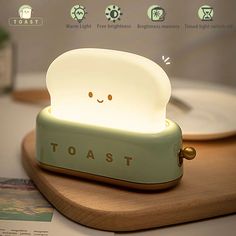 a toast light sitting on top of a wooden table