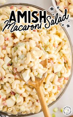 a bowl full of macaroni salad with a wooden spoon in it and the title overlay reads amish macaroni salad