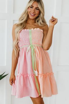 This strapless dress combines style and sweetness with its frilled trim and sexy, fitted smocked bodice. The flowy lower part and colorblock striped silhouette add a touch of allure. Complete the classic look with the included belt. Size Chart (INCH) Sizes US Sizes Euro Sizes UK Sizes Bust Waist Length Relax Relax Relax S 4-6 34-36 8-10 26.8 25.2 28.9 M 8-10 38-40 12-14 29.1 27.6 29.5 L 12-14 42-44 16-18 31.5 29.9 30.1 XL 16-18 46-48 20-22 34.6 33.1 30.7 XS 0-2 30-32 4-6 24.4 22.8 28.3 XXL 20-22 Light Denim Jacket, Formal Cocktail Dress, Button Front Dress, Spring Outfits Women, Floral Pants, Strapless Mini Dress, Cardigan Fashion, Pink Mini Dresses, Fashion Outlet