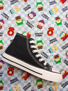 This is not a licensed Paramount Product. It is however, handcrafted from Licensed Paramount Fabric purchased from a licensed supplier. I am not affiliated with or sponsored by Paramount. My prices reflect the cost of the shoe and my time to apply the fabric.  I do not charge for the fabric. Fantastic Licensed South Park fabric, hand decorated canvas high top shoe. Great for South Park enthusiasts.  Customised Sides: You can choose the option to have just the outside of your shoes customised, (the ankle sides) and leave the instep sides blank = Option Outsides only. Or or you can choose both the ankle sides and the instep sides, (the whole shoe) = Option Outsides and Insides. Also, please message me when buying, which basic shoe colour you would like from all white, all black or black with High-top Sneakers With Rubber Toe Cap For Skateboarding, High-top Canvas Sneakers For School, Custom High-top Sneakers With Rubber Toe Cap For Streetwear, School Lace-up High-top Sneakers With Rubber Sole, High-top Canvas Shoes With Laces, High-top Canvas Shoes With Rubber Toe Cap, High-top Canvas Shoes With Vulcanized Sole, Mid-top Canvas Shoes With Gum Sole, Lace-up High-top Sneakers With Rubber Sole For School