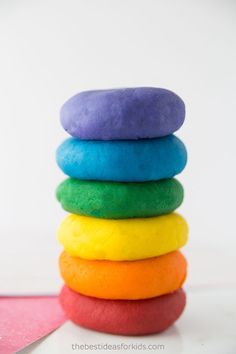 a stack of colorful donuts sitting on top of each other