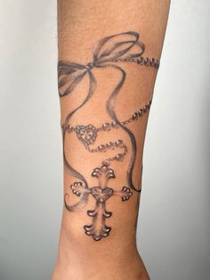 #tatttoo #bows #rosary #coquette #chicana #fineline #coachellavalley #palmsprings Rosary Coquette, Rosary Tattoo For Women Arm, Girly Cross Tattoos, Chicana Tattoo Design, Chicana Tattoos, Bows Tattoo, Cute Girly Tattoos, Rosary Tattoo Wrist, Devotion Tattoo