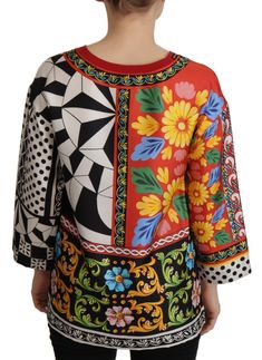 Indulge in the opulence of Italian craftsmanship with this stunning silk blouse by Dolce & Gabbana. This 100% authentic round neck top is adorned with a lavish baroque and floral print, reflecting the brand’s signature aesthetic. A combination of luxury and artistry, it’s a statement piece that’s guaranteed to turn heads. Color: Multicolor Material: 100% Silk Country of origin: IT Made in Italy Logo details Baroque Floral, Italy Logo, Round Neck Blouse, Round Neck Top, Dolce E Gabbana, Women Sleeve, Round Neck Tops, Pierre Cardin, Dolce & Gabbana