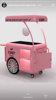 an ice cream cart is shown in pink