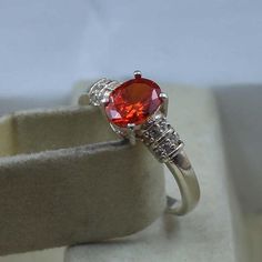 Orange Zircon Ring - 925 Sterling Silver Ring - Oval Shape Ring - Handmade Ring - Unique Engagement Ring - Wedding Ring - Gift For Her Gemstone : Lab Orange Zircon Stone Size : 6 x 8 MM Stone Shape : Oval Secondary Stone : Cubic Zirconia Faceted/cab : Faceted Ring Size : All Size Available Band Color : Silver Made In (INDIA) Payment Policy ---------------------------------- We accept payment through PayPal Payment should be made within 3 days of purchase. Delivery Time -------------------------- Oval White Gold Crystal Ring Stamped 925, Oval Crystal Promise Ring Stamped 925, Oval Cubic Zirconia Ring Stamped 925, Oval Diamond Ring For Promise, Oval 925 Stamped Rings For Anniversary, Oval Silver Ruby Promise Ring, Oval Shape Ring, Faceted Ring, Unique Engagement Ring