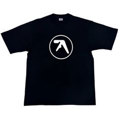 Elevate your style with our Aphex Twin Logo T-Shirt, the epitome of Y2K rave aesthetic. Crafted with a high-quality cotton blend material, this unisex shirt is a must-have for anyone seeking to channel the vibes of the 90s aesthetic. Whether you're hitting the rave scene or simply want to infuse your everyday wardrobe with retro charm, this shirt has you covered. Free shipping in the US and worldwide. S - Chest: 108 cm (42.52 inches); Length: 70 cm (27.56 inches); M - Chest: 114 cm (44.88 inches); Length: 72 cm (28.35 inches); L - Chest: 118 cm (46.46 inches); Length: 74 cm (29.13 inches); XL - Chest: 122 cm (48.03 inches); Length: 76 cm (29.92 inches); Embrace the iconic Aphex Twin logo, a symbol of electronic music culture and underground vibes. Wear it proudly to showcase your love for Aphex Twin T Shirt, Aphex Twin Logo, Rave Aesthetic, Rave Scene, Aphex Twin, Music Culture, Rave Fashion, 90s Aesthetic, Electronic Music