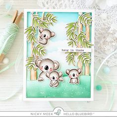 a card with two koalas on it