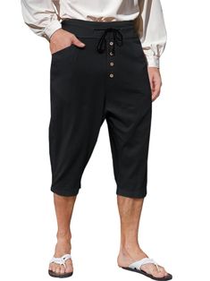 PRICES MAY VARY. 【Feature】: Mens Renaissance pirate pants, drawstring elastic waist, waist with buttons decorations, two side pockets and hip big pockets, solid color, loose fit, comfort and versatility. Low crotch, very full leg for ease of movement. 【Material】: Mens casual capri pants is made of 70% cotton and 30% linen, which is soft and durability, lightweight, no pilling, no fading, loose-fit and friendly to your skin. the hight quality fabric will ensure maximum comfort and flexibility. 【M Pirate Pants Pattern, Mens Pirate Cosplay, Medieval Pants Male, Pirate Belts, Pirate Pants For Men, Men’s Pirate Outfit, Colonial Halloween, Pirate Pants, Medieval Pirate