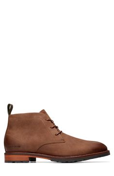 A smart lug sole grounds a stylish chukka boot fitted with GrandOS Energy Foam for all-day cushioning. Lace-up style Water-resistant Leather upper/textile lining/rubber sole Imported