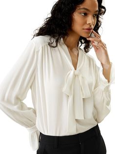 The palace pleat design on the cuffs adds an extra element of sophistication, creating an atmosphere of refined elegance. Whether it's for work or casual outings, this blouse is versatile and suitable for any occasion. 23MM Ghost Crepe V-neck Neckline ribbon Pleated cuffs Suitable for casual work and vacations Ribbon Blouse, Silk Comforter, Neck Ribbon, Silk Pajamas Women, Silk Bedding Set, Winter Wardrobe Essentials, Silk Nightwear, Camisole Set, Striped Midi Skirt