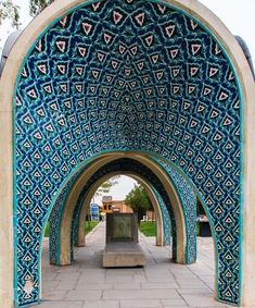 an archway with blue and white designs on it