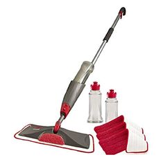 a vacuum mop and cleaning cloths on a white background