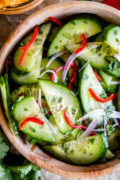 thai cucumber salad in a wooden bowl