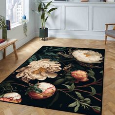 an area rug with flowers and leaves on it