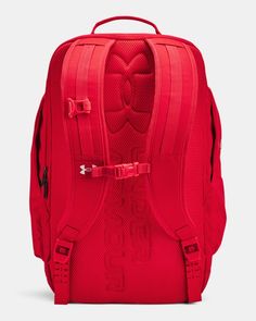 a red backpack with straps on it