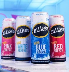 three cans of red, white and blue drinks