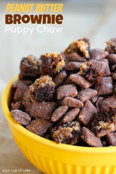 a yellow bowl filled with brownie puppy chow