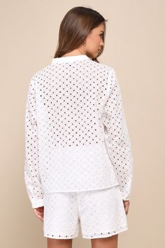 When it comes to relaxation, a cool drink, a sea breeze, and the Lulus Caribbean Chic Ivory Cotton Eyelet Embroidered Long Sleeve Top are a perfect combo! Eyelet-embroidered cotton shapes this breezy top that has long sleeves with button cuffs and an understated collared neckline. Pair with the matching shorts for a complete look! Fit: This garment fits true to size. Length: Size medium measures 22" from shoulder to hem. Bust: Great for any cup size. Waist: Not Fitted - comfortable room througho Spring V-neck Tops With Broderie Anglaise, White Cotton V-neck Embroidered Top, White Button-up Eyelet Blouse, Spring Eyelet Button-up Top, Elegant Button-up Tops With Broderie Anglaise, Lulu Fashion, Personal Marketing, Cotton Tops, Long Sleeve Tops