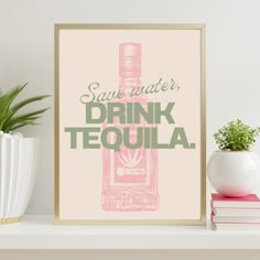 a pink and green poster with the words save water, drink tequila on it next to a potted plant