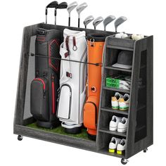 an open golf bag with several different types of golf clubs in it and on the bottom shelf