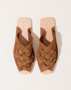 Suede Slip-on Sandals With Woven Sole, Suede Slip-ons With Woven Sole, Leather Woven Leather Slip-on Sandals, Summer Leather Mules With Intrecciato Weave, Leather Open Toe Mules With Woven Sole, Leather Flat Slip-ons With Woven Sole, Flat Heel Woven Leather Mules, Suede Slippers With Leather Sole For Spring, Casual Leather Slippers With Woven Sole