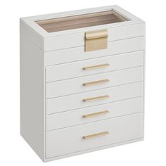 a white drawer with gold handles and drawers