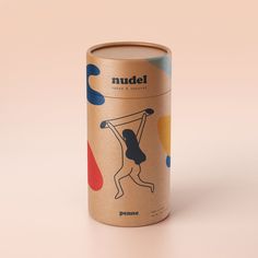 an empty can with the word nudel on it's side and a woman doing yoga