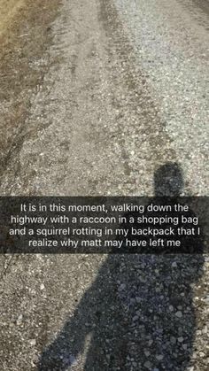 the shadow of a person walking down a road with a quote on it that reads, it is in this moment, waking down the highway