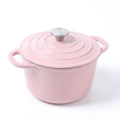 a pink casserole dish with a lid on a white background, it appears to be used for cooking