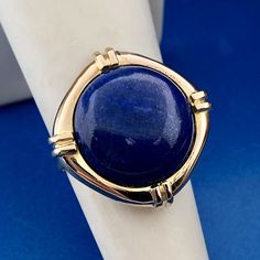 * Vintage 14K Yellow Gold Lapis-Lazuli Cabochon Modernist Abstract Cocktail Ring * Ring size: 6.0 * Top of ring measures: 3/4" x 3/4" * Lapis-Lazuli round cabochon measures: approximately 14.75 mm * Ring weight: 4.1 tgw * Marked: Makers Mark*585 * Condition: Great * G1447    Exported By ExportYourStore :) Gold Cocktail Ring, Cabochon Ring, Blue Rings, Ring Ring, Cocktail Ring, Cocktail Rings, Womens Jewelry Rings, Makers Mark, Lapis Lazuli