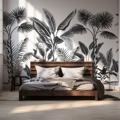 a bed sitting in front of a wall with palm leaves on it's side