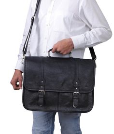 NEW Levinson Leather Goods Summer 2024 Featured Collection Introducing our Landon Black Leather Messenger Bag! Handcrafted with premium buffalo leather and accented with sleek silver hardware, this messenger bag exudes sophistication and durability. With its timeless design and quality materials, this bag is the perfect combination of style and functionality. Upgrade your daily carry with the Landon Messenger Bag! Features: Adjustable shoulder strap Leather top handle Tuck lock front closures In Classic Satchel With Silver-tone Hardware And Flap, Classic Satchel With Silver-tone Hardware For Everyday Use, Classic Saddle Bag With Silver-tone Hardware For Everyday, Business Satchel Shoulder Bag With Silver-tone Hardware, Business Crossbody Satchel With Silver-tone Hardware, Business Shoulder Bag Satchel With Silver-tone Hardware, Classic Business Satchel With Silver-tone Hardware, Rectangular Travel Briefcase With Silver-tone Hardware, Rectangular Briefcase With Silver-tone Hardware For Everyday Use